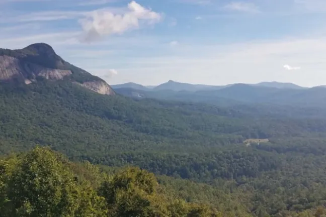 a large mountain in the background