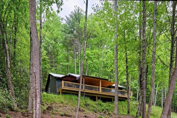 a wooden bridge in a forest