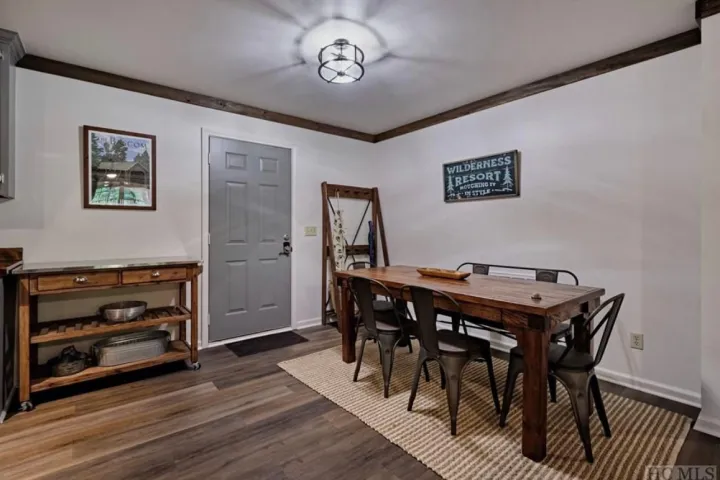 a living room with a wooden floor